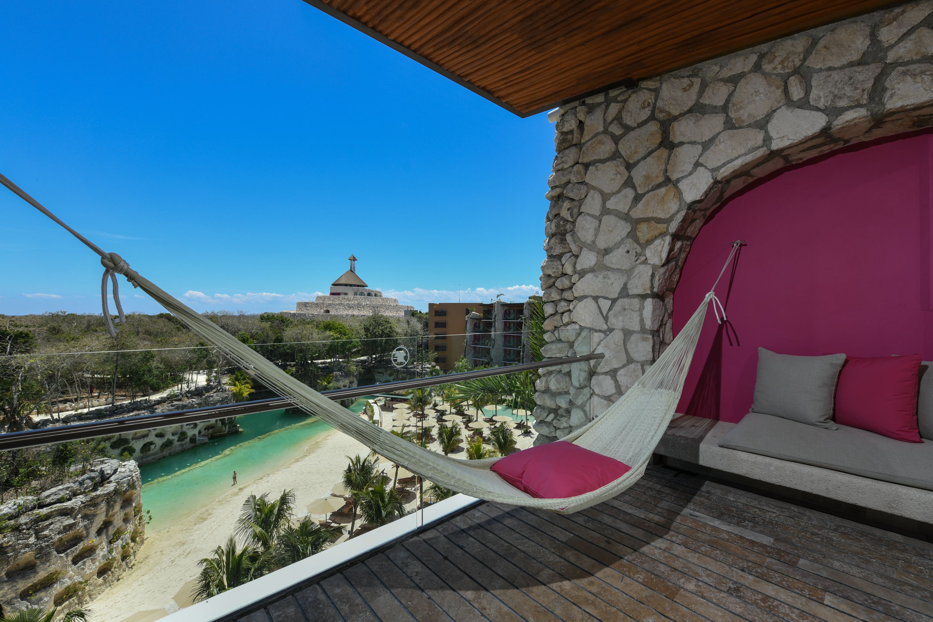 A balcony hammock overlooking the lagoon at Hotel Xcaret Mexico
