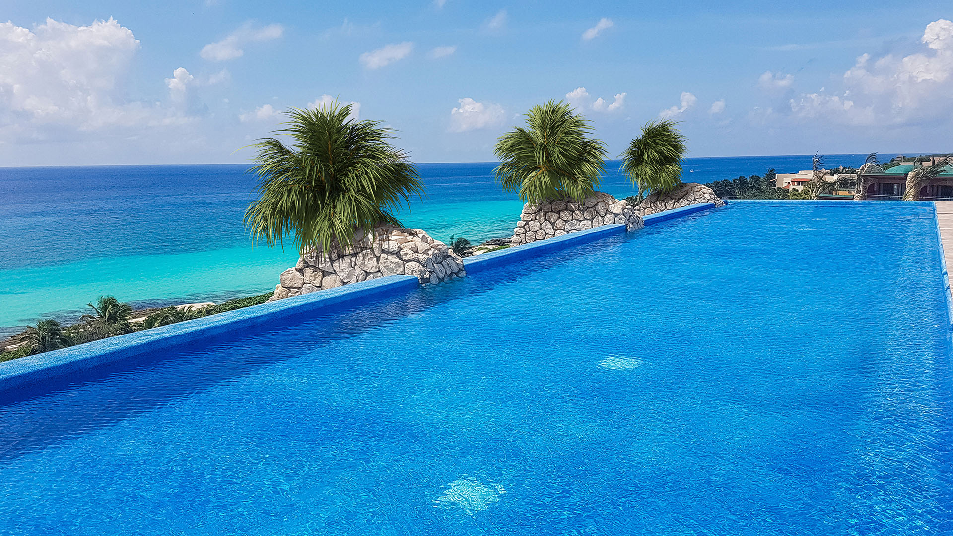 Rooftop infinity pool overlooking the sea at Hotel Xcaret Mexico
