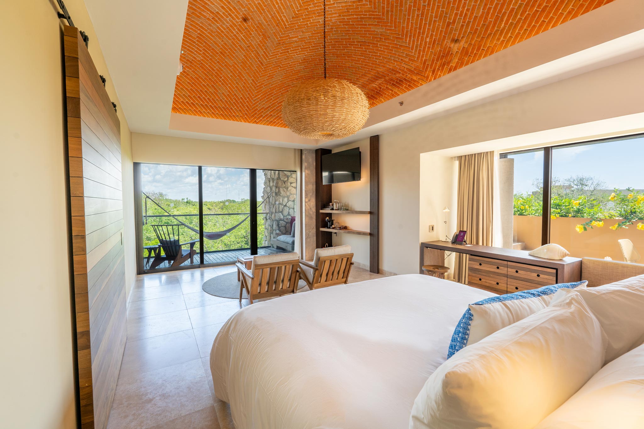 A suite with a vaulted brick ceiling at Hotel Xcaret Mexico