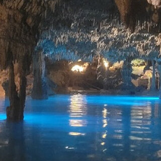 The illuminated underground river at Xplor