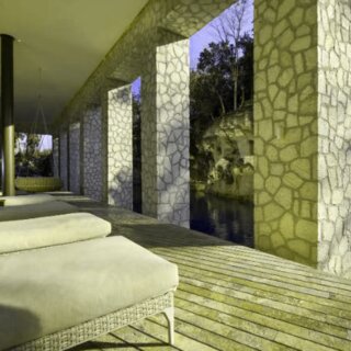 Muluk Spa treatment beds beside the river